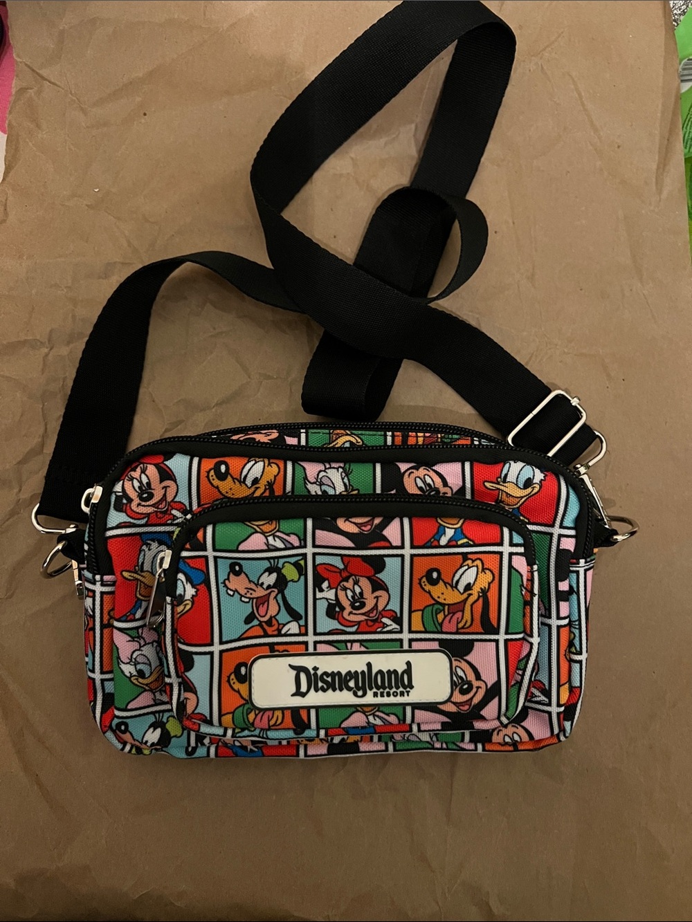 Multi-Color Disney Character Crossbody Bag also becomes a Fanny Pack